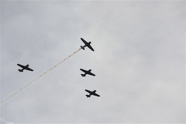 Planes in Formation Amongst Overcast Sky