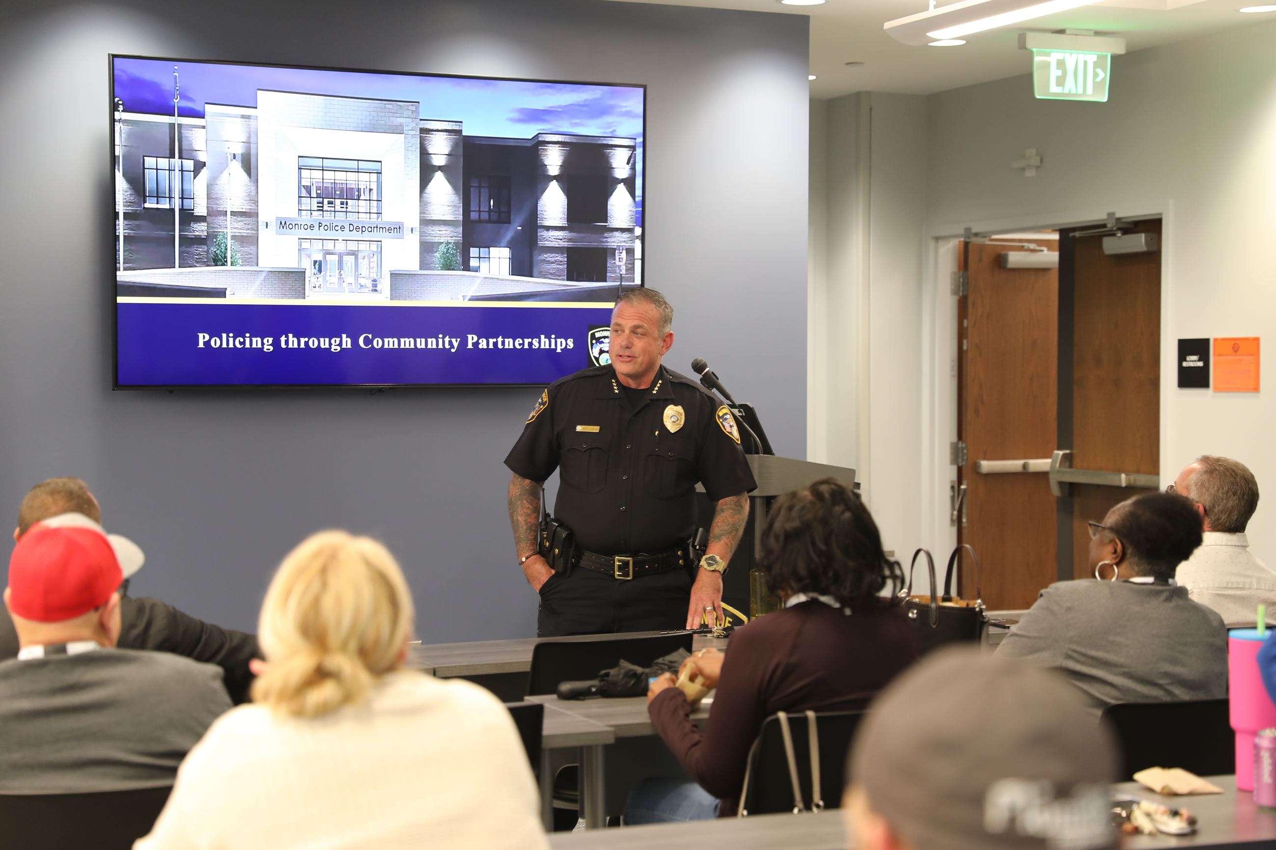 Citizens Academy participants watch presentations at the Police Department.